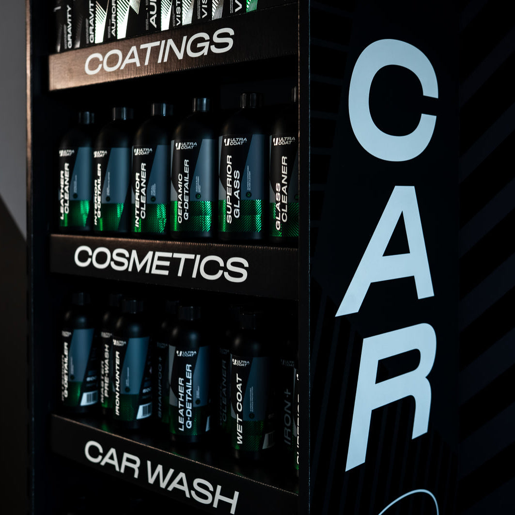 ULTRACOAT cardboard display stocked with car care products and coatings