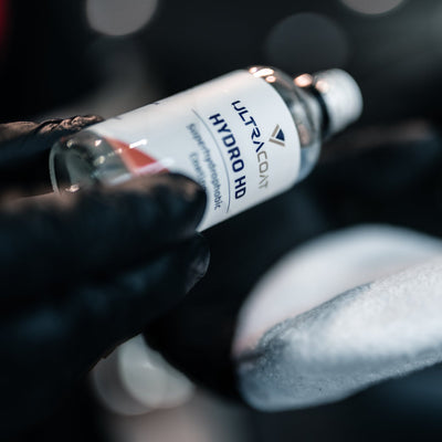 ULTRACOAT Hydro HD bottle beside a coating applicator