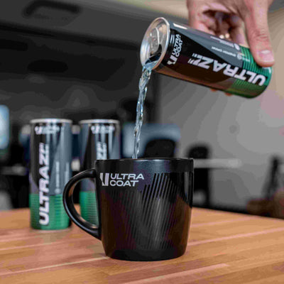 Black ULTRACOAT mug while pouring an ULTRAZZZ drink