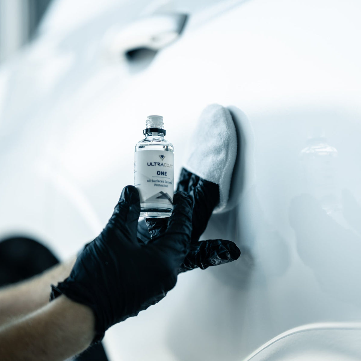 ULTRACOAT One bottle during coating application on automotive paint